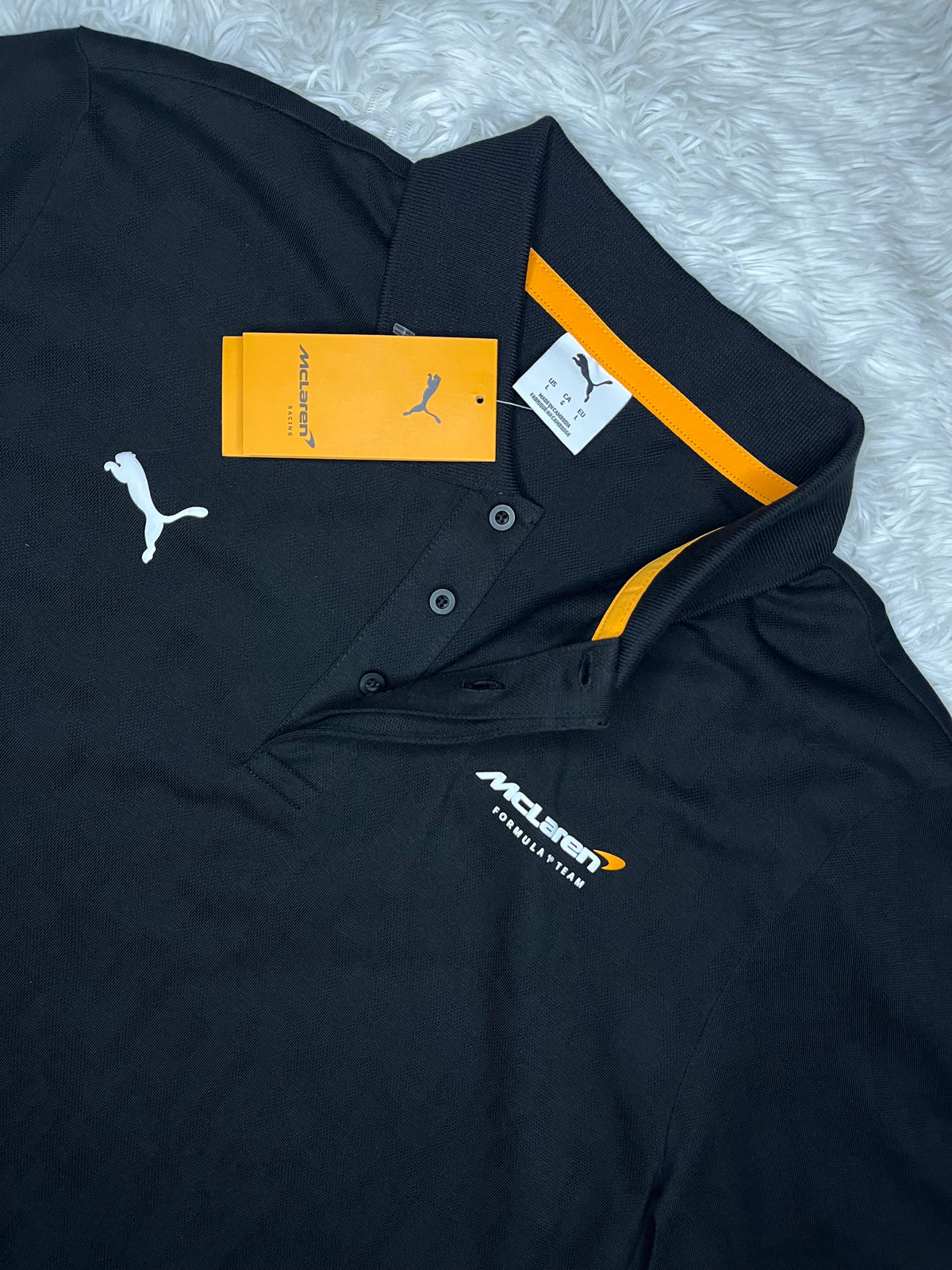POLERA TIPO PIQUÉ PUMA MCLAREN RACING 2026 NEGRA