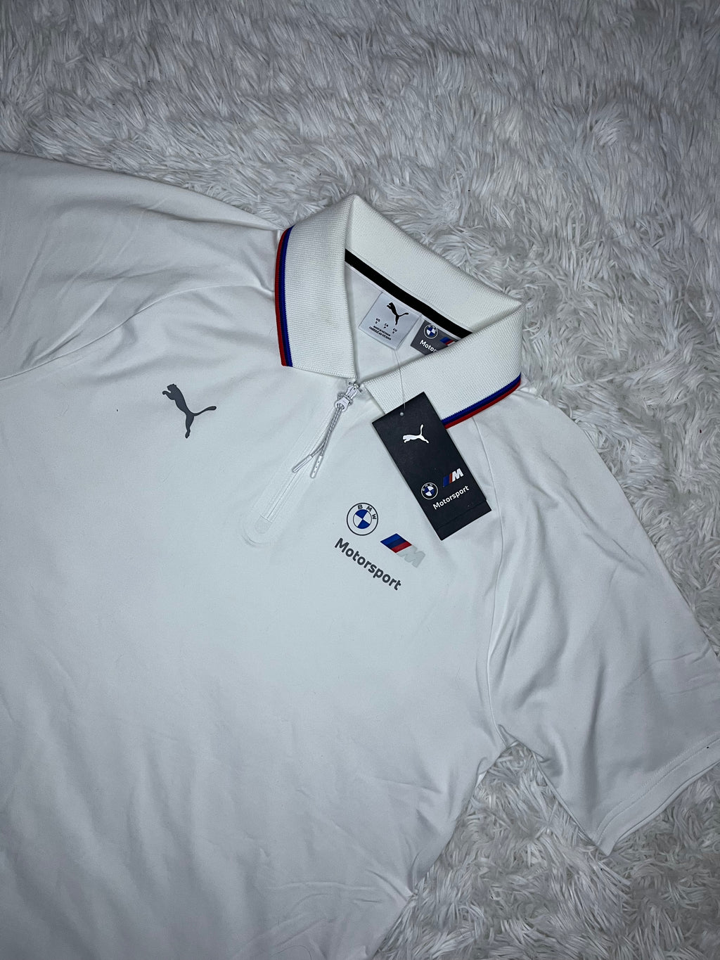 POLERA TIPO PIQUÉ BLANCA CON CIERRE PUMA BMW MOTORSPORT