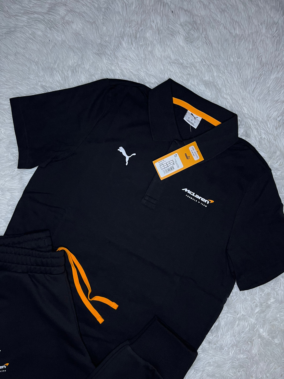 CONJUNTO PUMA MCLAREN RACING 2026 NEGRO: PIQUÉ Y PANTALÓN DE BUZO