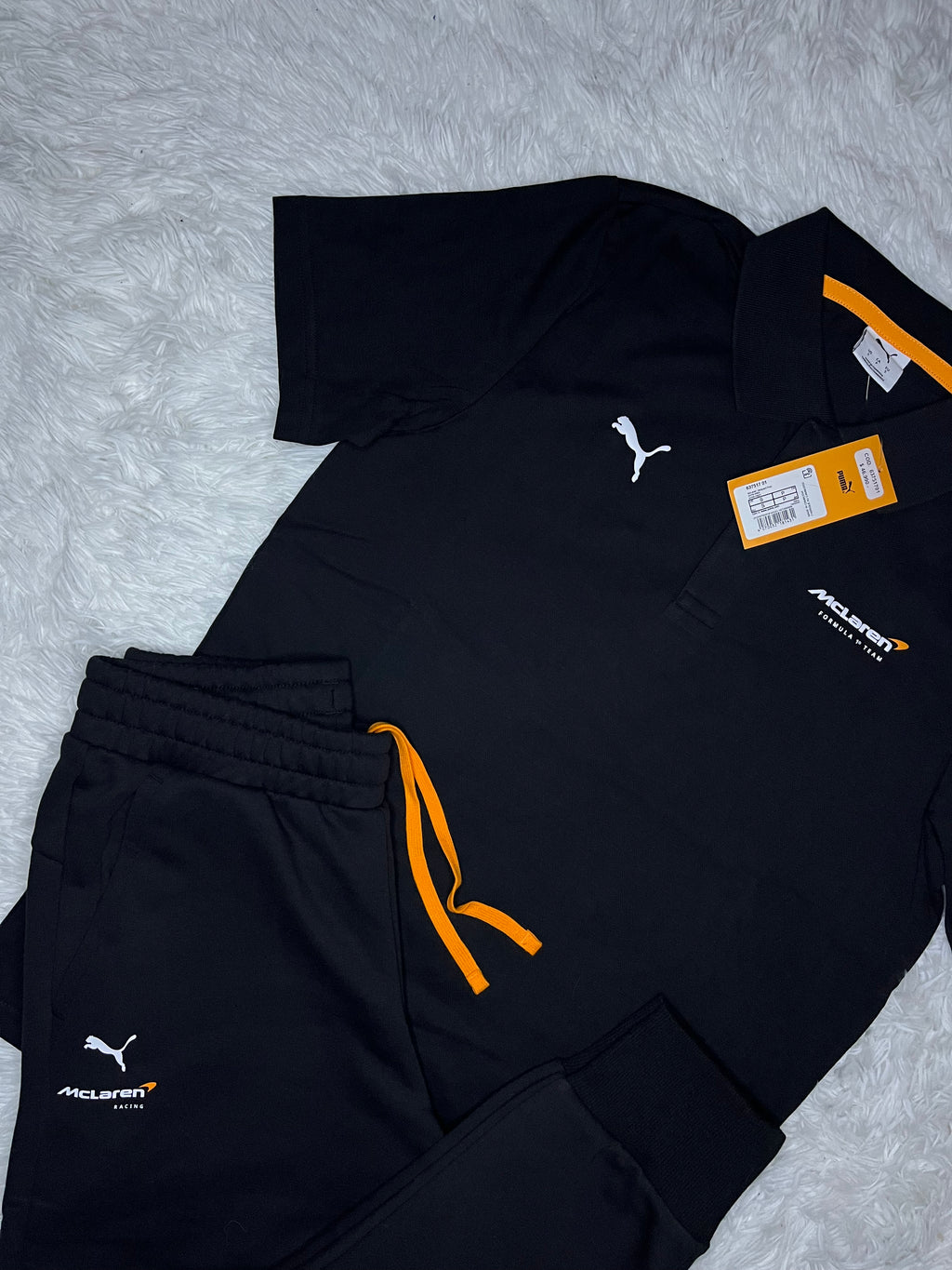 CONJUNTO PUMA MCLAREN RACING 2026 NEGRO: PIQUÉ Y PANTALÓN DE BUZO