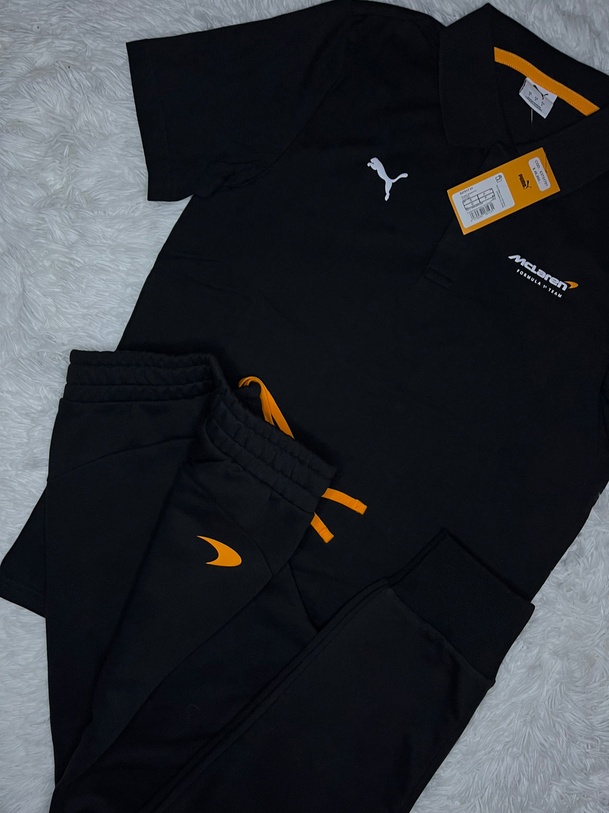 CONJUNTO PUMA MCLAREN RACING 2026 NEGRO: PIQUÉ Y PANTALÓN DE BUZO