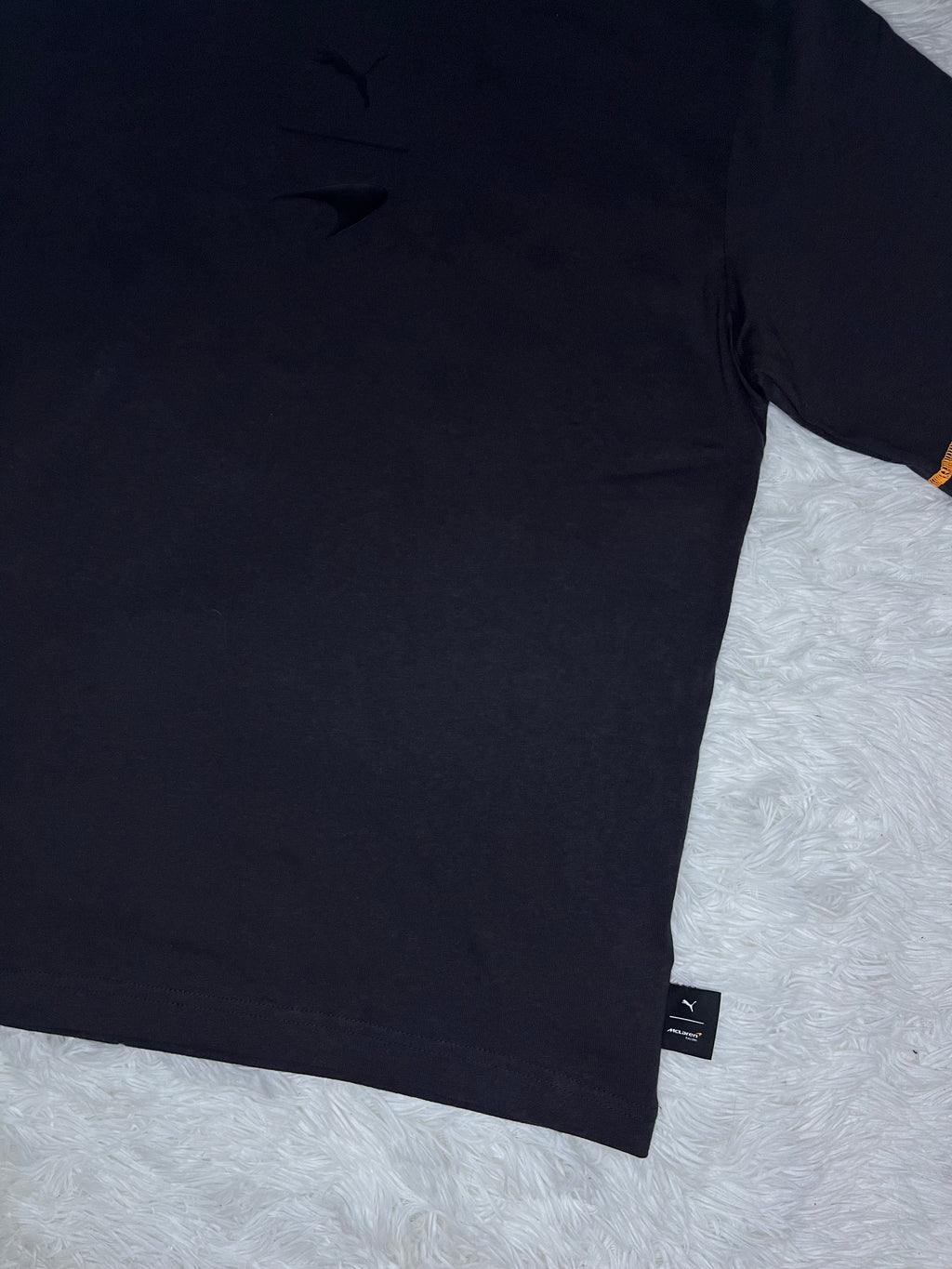 POLERA PUMA MCLAREN RACING 2026 NEGRA DE CORTE HOLGADO