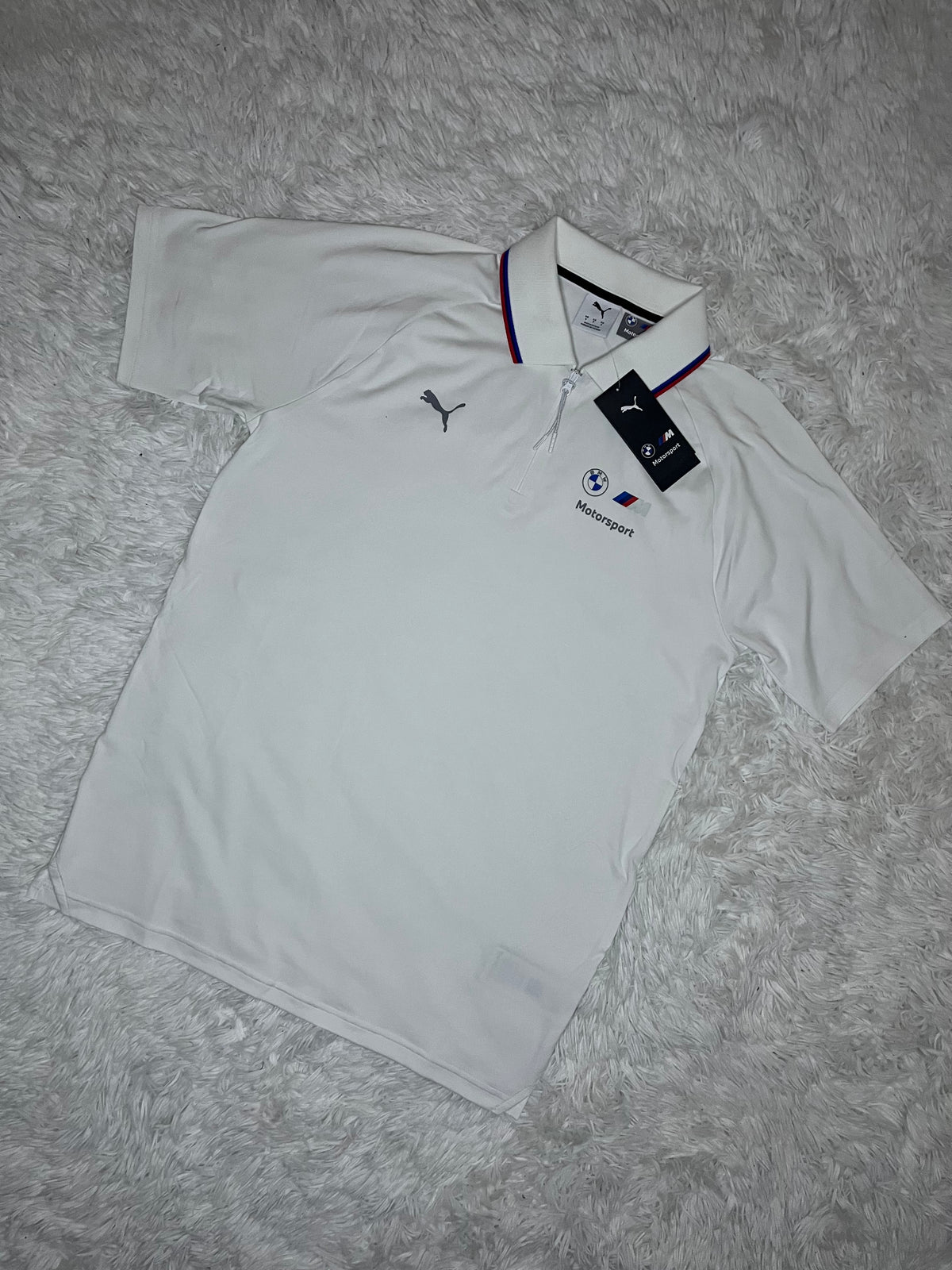 POLERA TIPO PIQUÉ BLANCA CON CIERRE PUMA BMW MOTORSPORT
