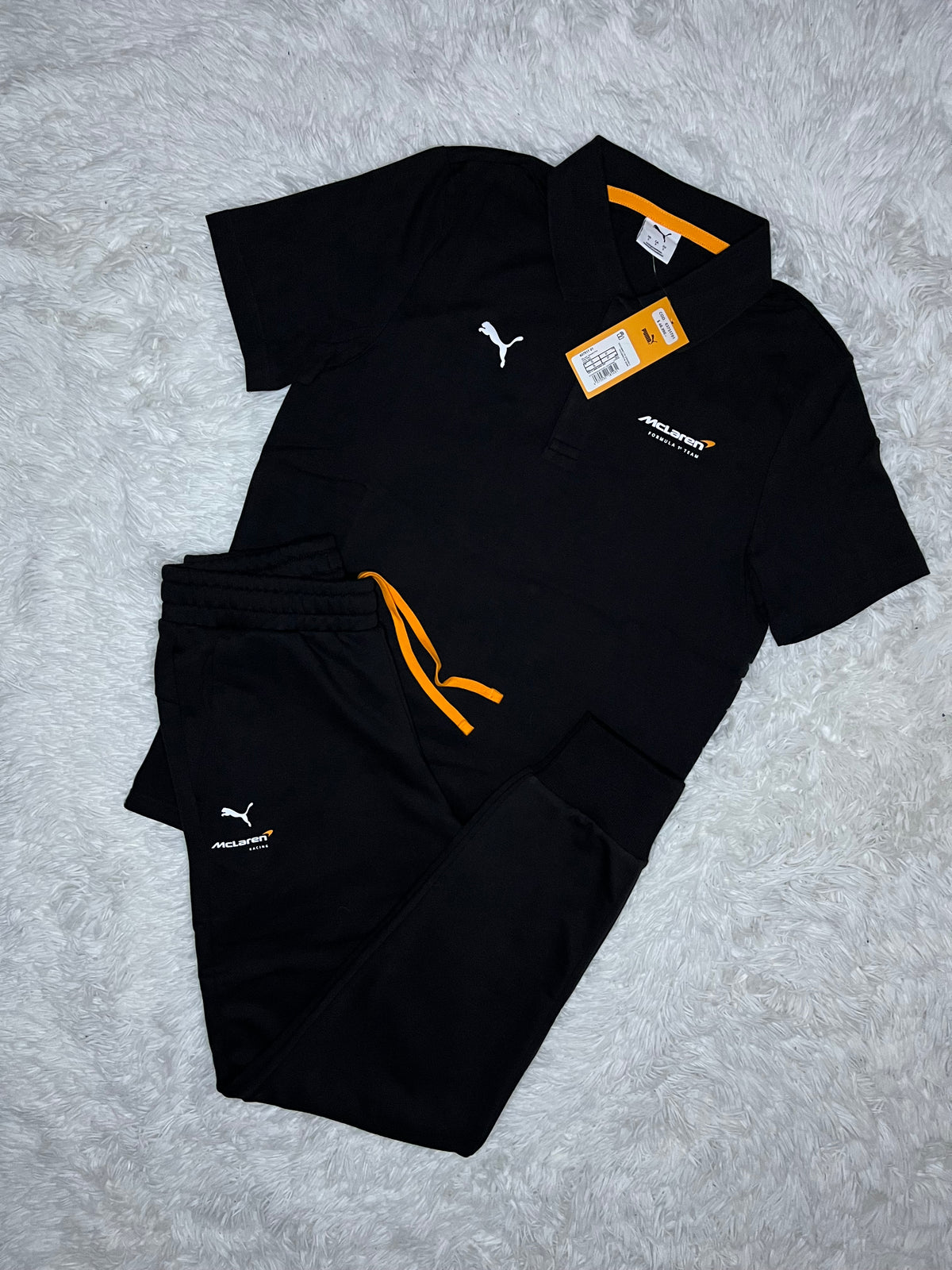CONJUNTO PUMA MCLAREN RACING 2026 NEGRO: PIQUÉ Y PANTALÓN DE BUZO