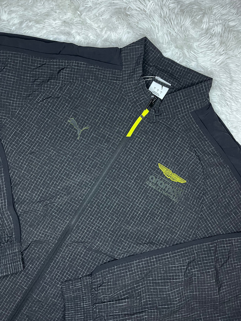 CHAQUETA CORTAVIENTO NEGRA PUMA ASTON MARTIN F1 2026