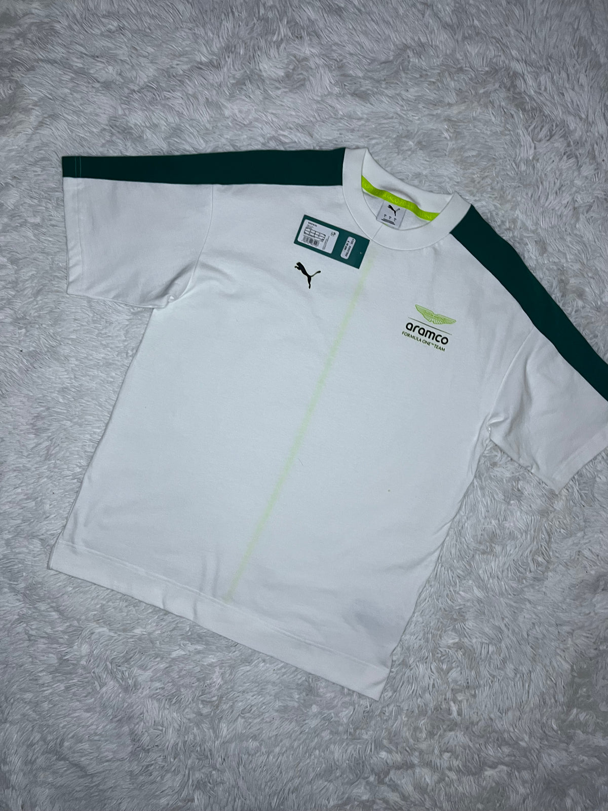 POLERA PUMA ASTON MARTIN F1 2026 BLANCA DE CORTE HOLGADO