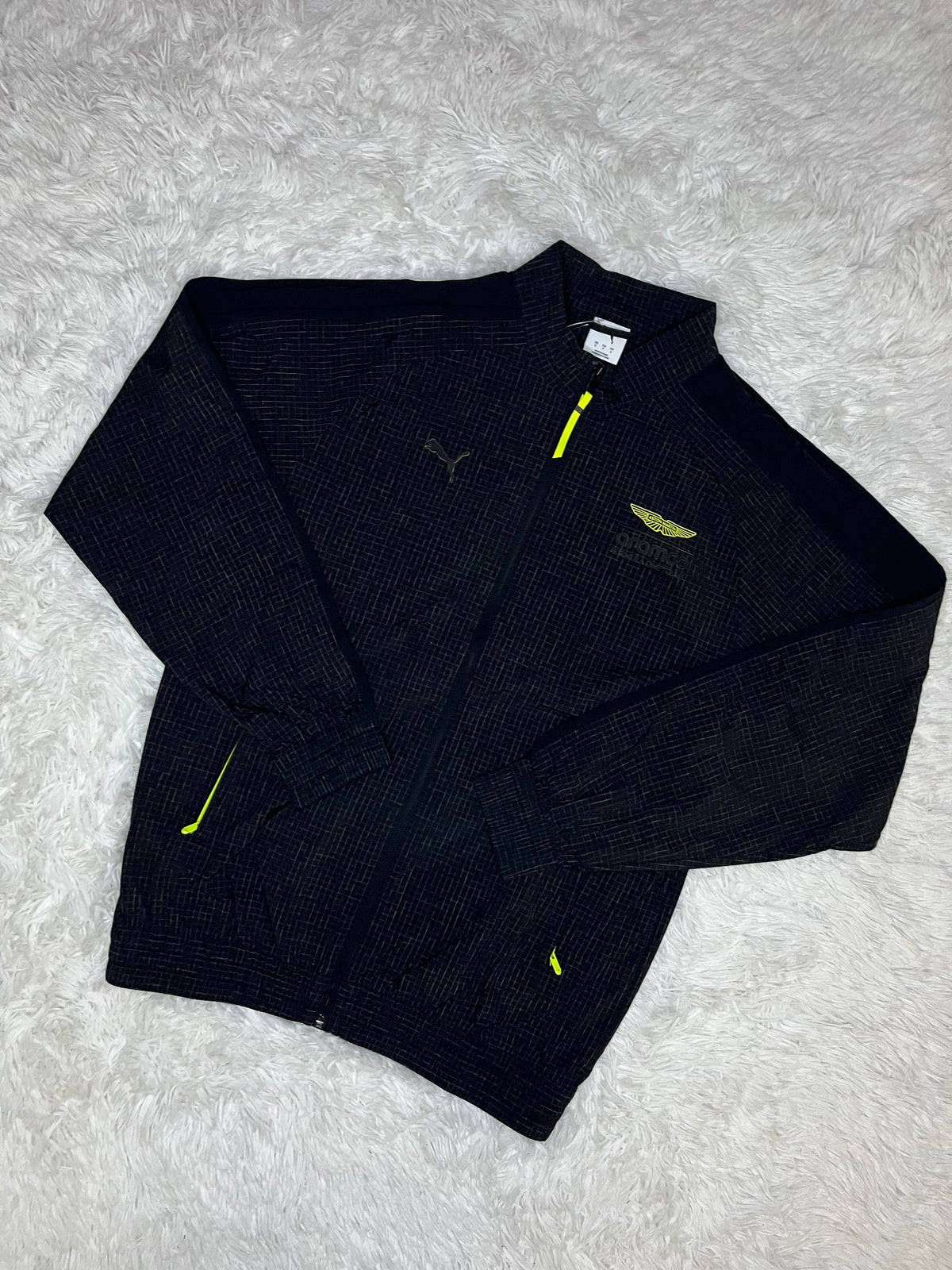 CHAQUETA CORTAVIENTO NEGRA PUMA ASTON MARTIN F1 2026
