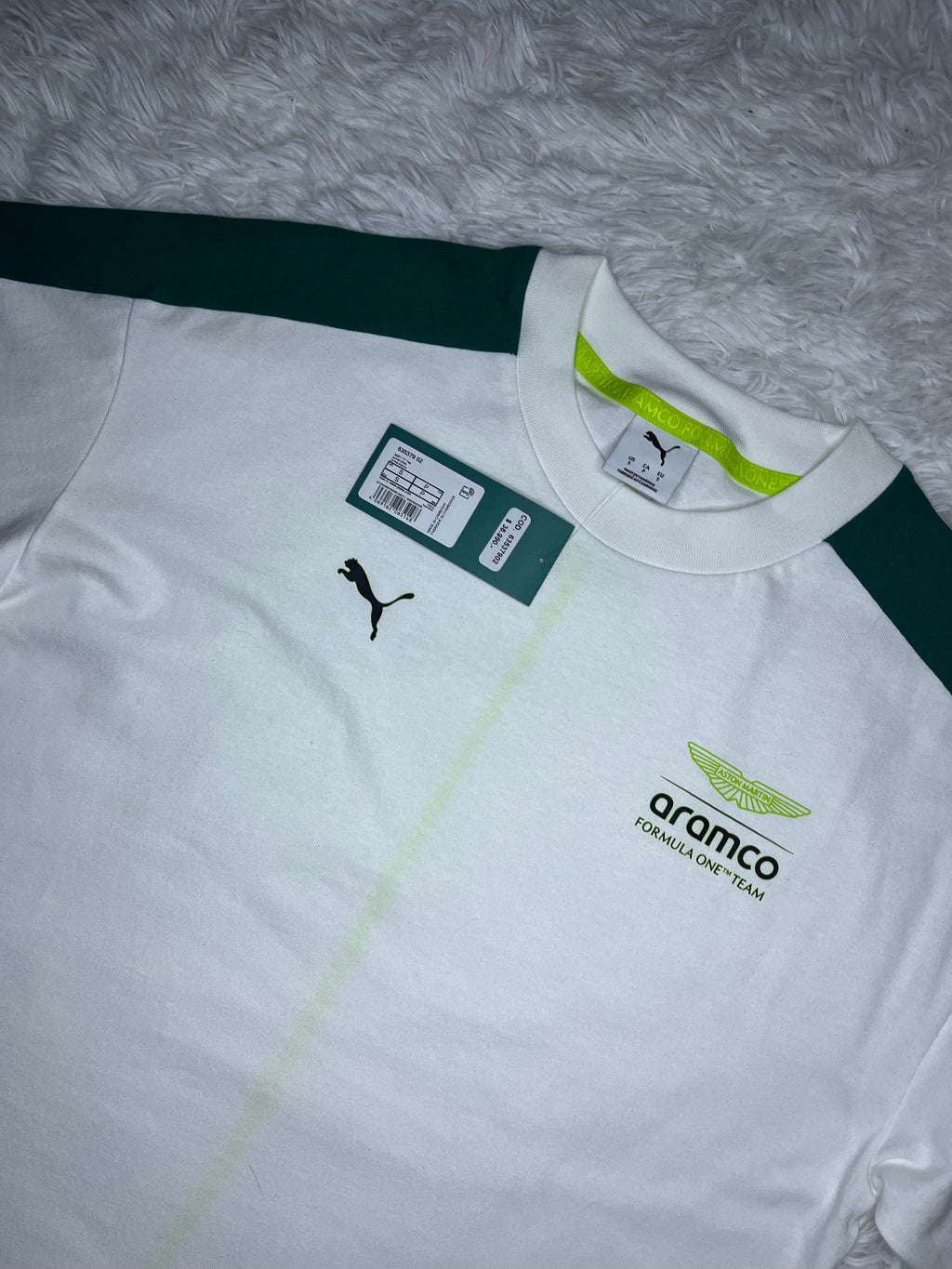 POLERA PUMA ASTON MARTIN F1 2026 BLANCA DE CORTE HOLGADO