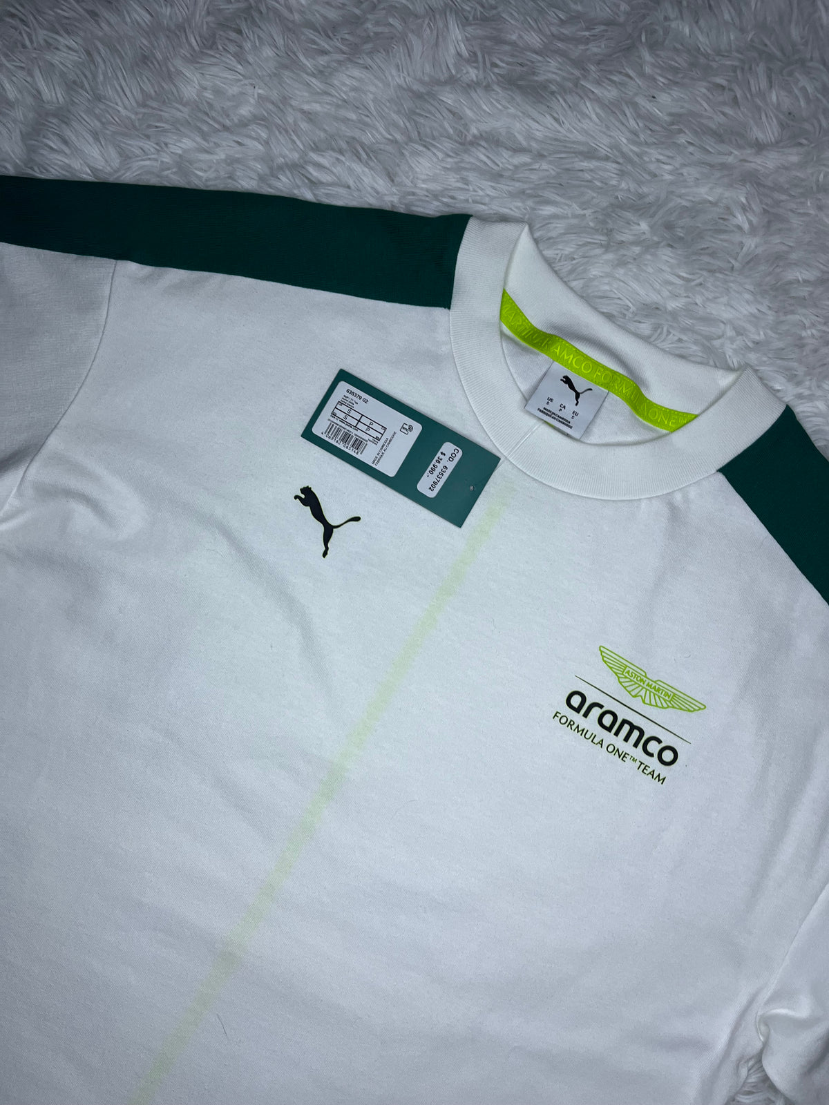 POLERA PUMA ASTON MARTIN F1 2026 BLANCA DE CORTE HOLGADO