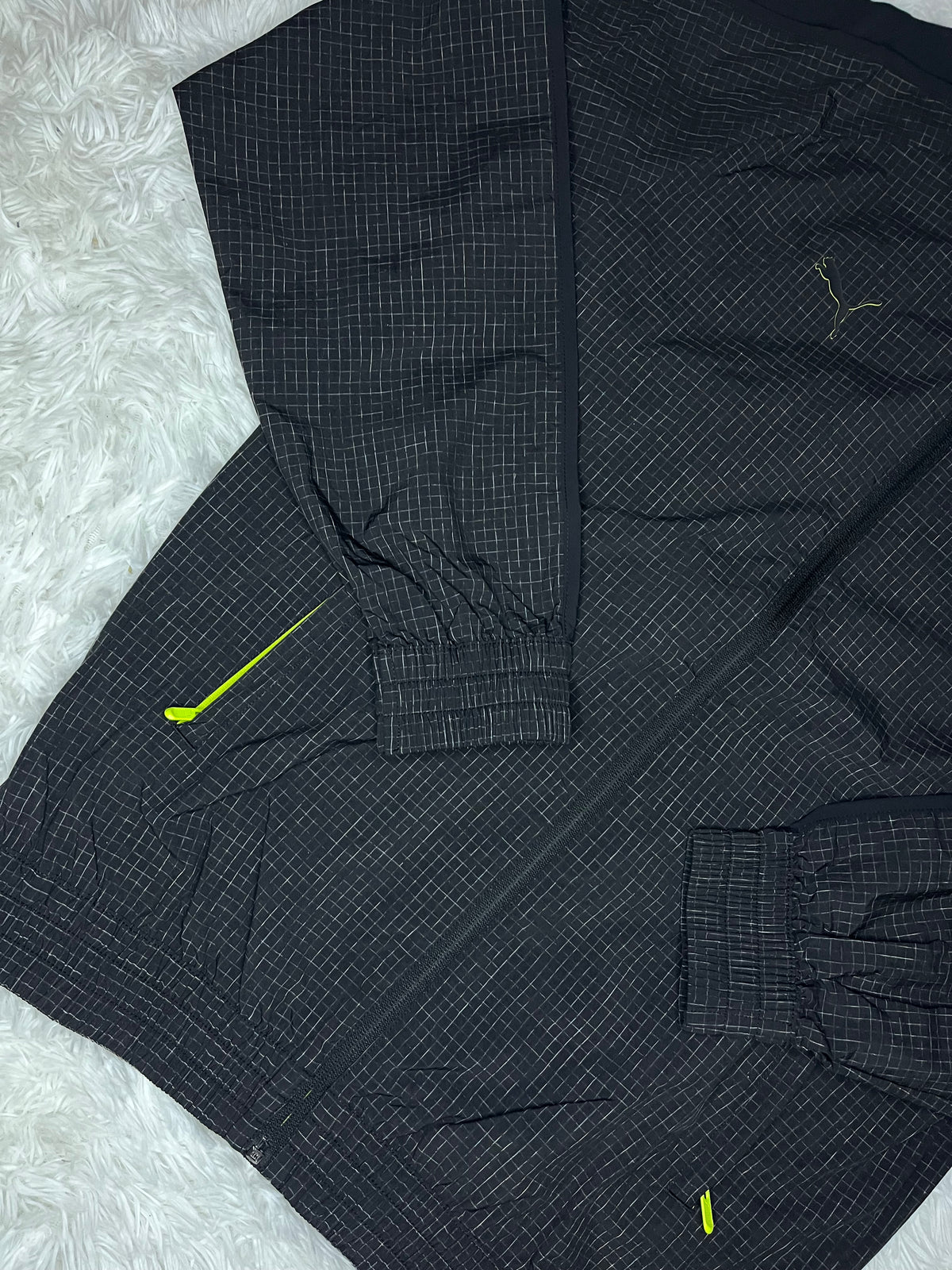 CHAQUETA CORTAVIENTO NEGRA PUMA ASTON MARTIN F1 2026