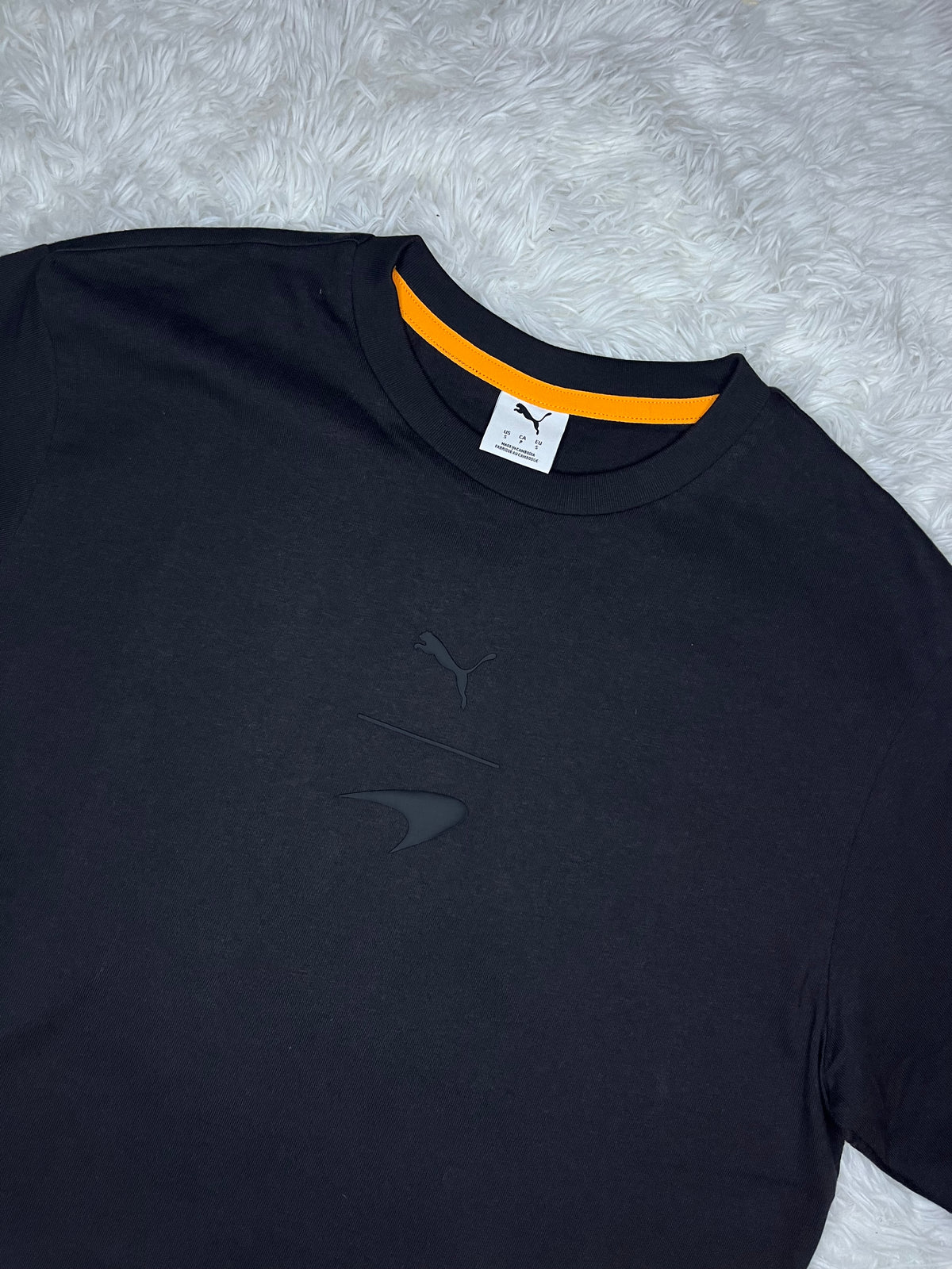POLERA PUMA MCLAREN RACING 2026 NEGRA DE CORTE HOLGADO