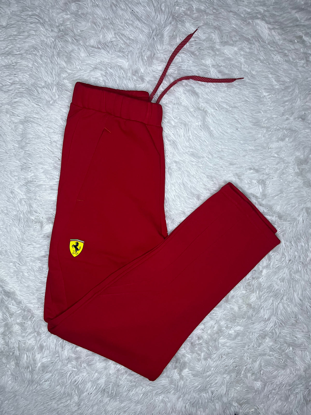 PANTALÓN DE BUZO PUMA RECTO SCUDERIA FERRARI ROJO